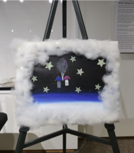 A painting featuring a cloud/cotton border, a night sky with stars, and two people flying in the air.