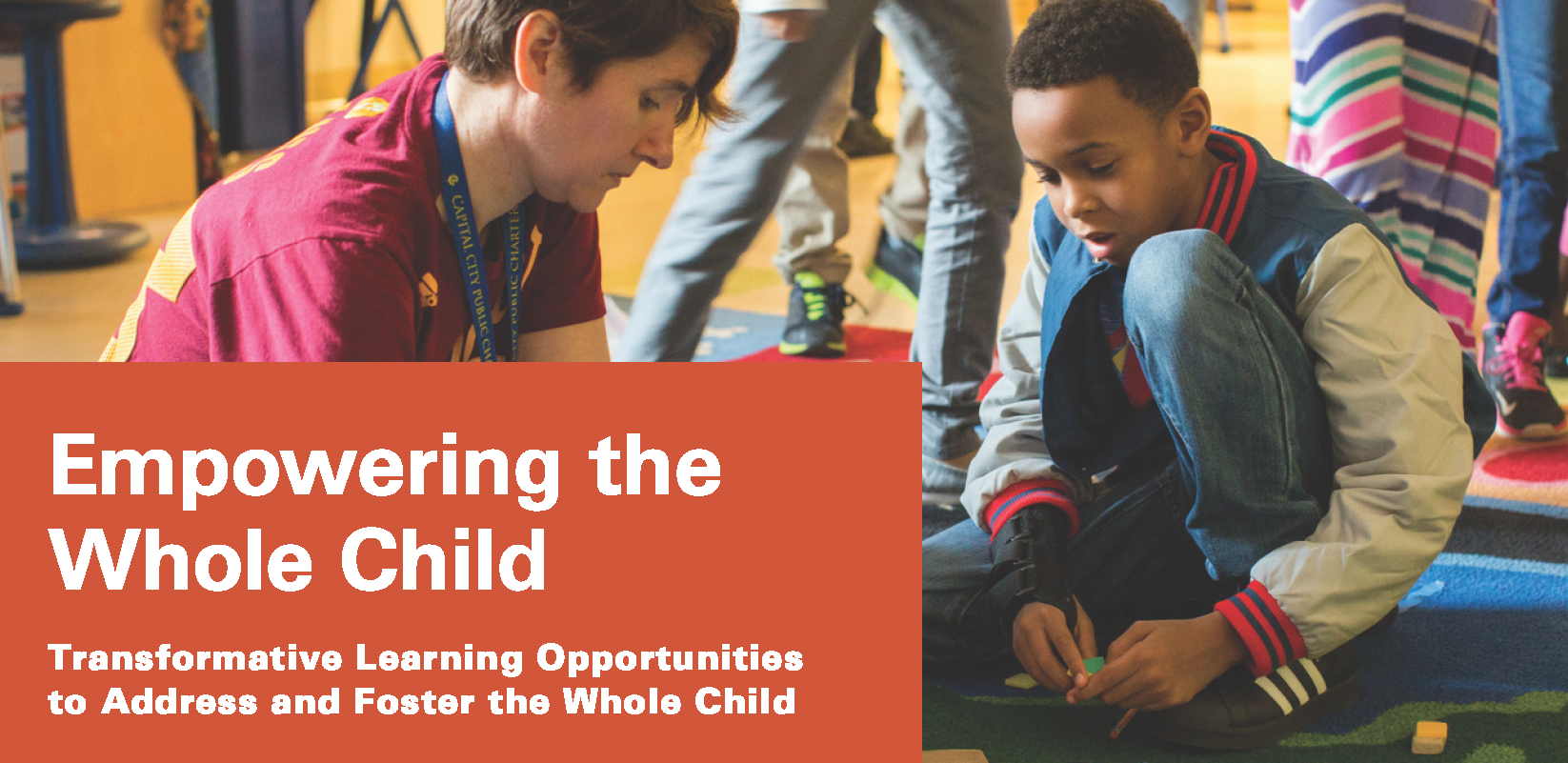 Image of a teacher and a student working on a project on the floor together. An orange square overlaying the image says, "Empowering the Whole Child. Transformative learning opportunities to address and foster the whole child.