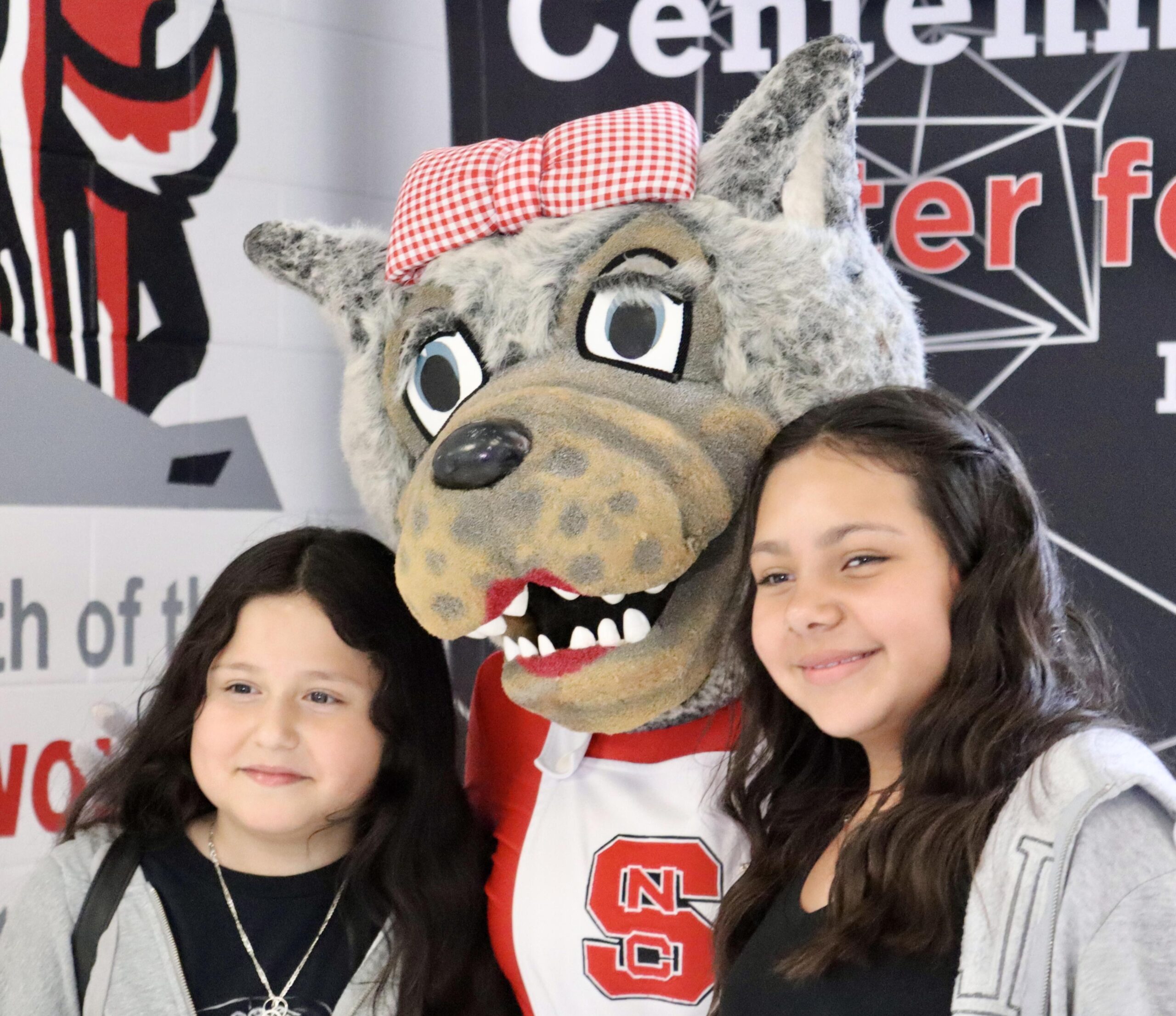 Students pose with Ms. Wuf, one of NC State's mascots