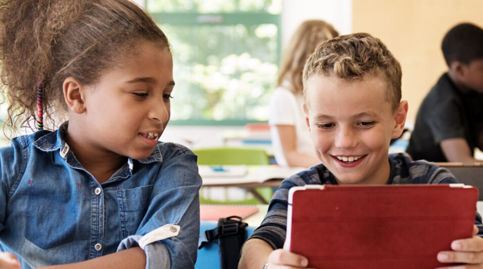 Students using Ipad in classroom setting
