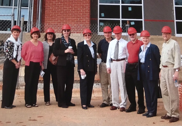 College of Education faculty on the build site for the Friday Institute