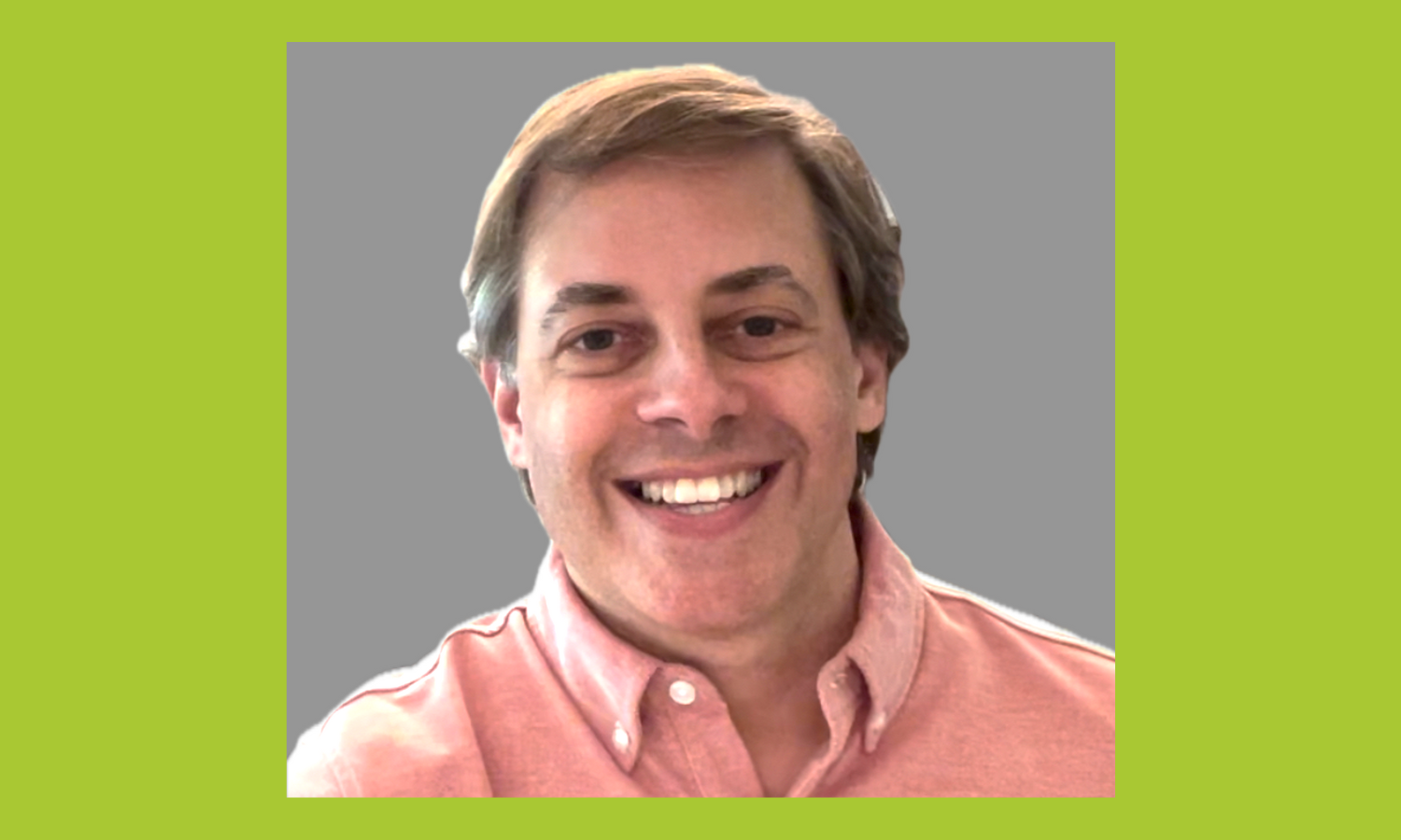 Headshot of Mitch Prinstein, a man in a salmon button up shirt