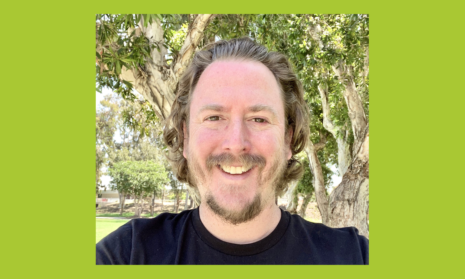 Headshot of Mike Karlin, a man with blonde hair and a goatee